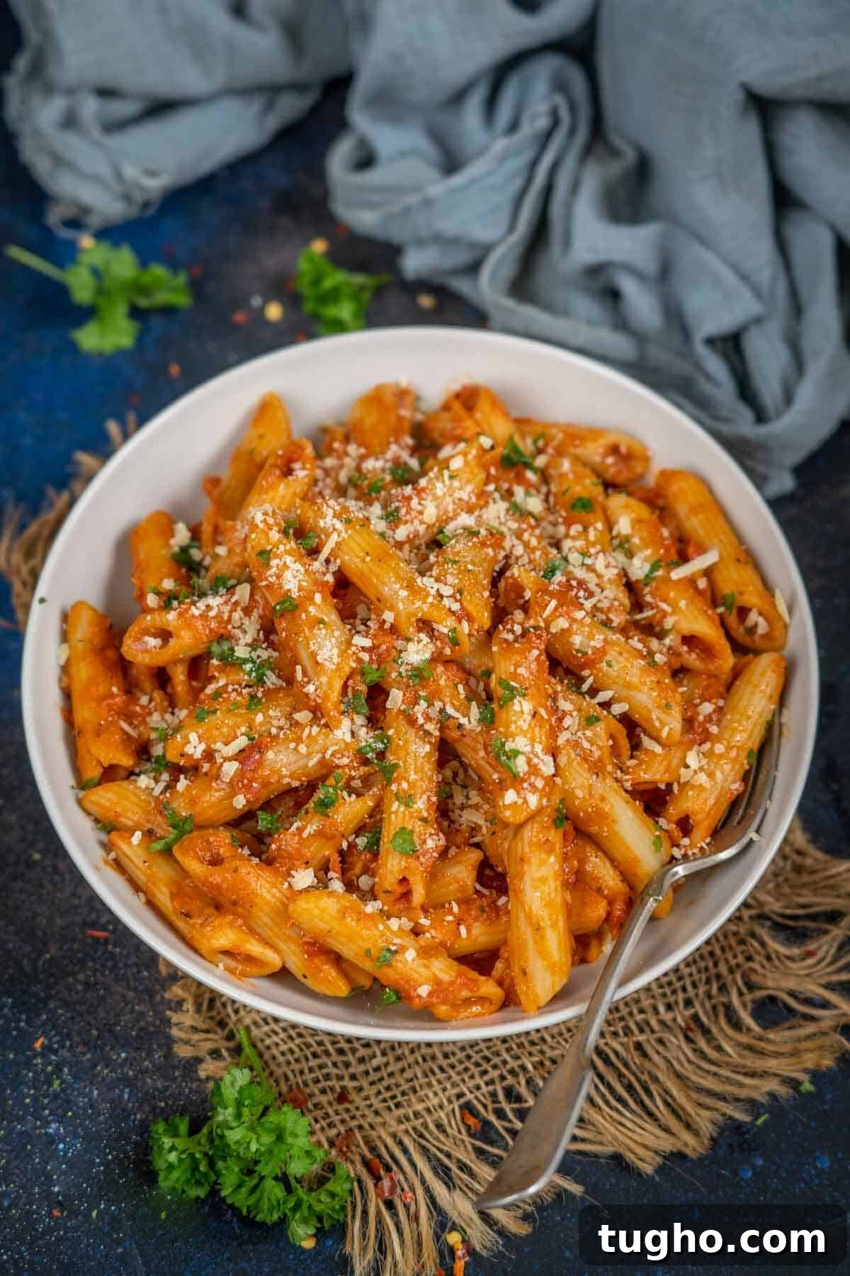 Chicken penne alla vodka pasta served in a bowl.