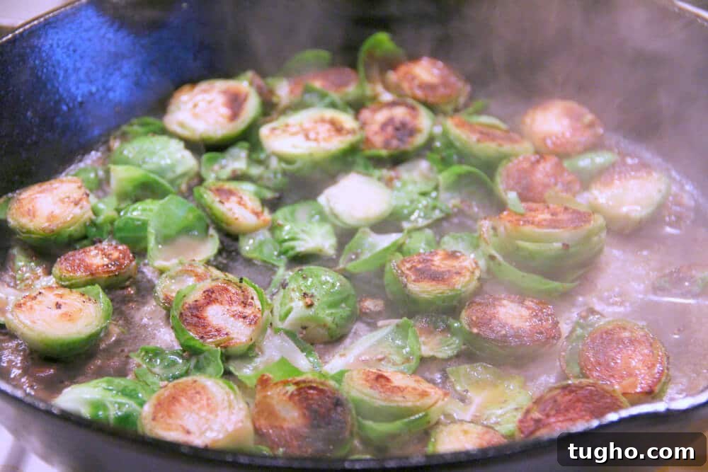 Roasted Brussels Sprouts with Maple Balsamic Glaze 4 Maple and balsamic glazed Brussels sprouts in a white dish