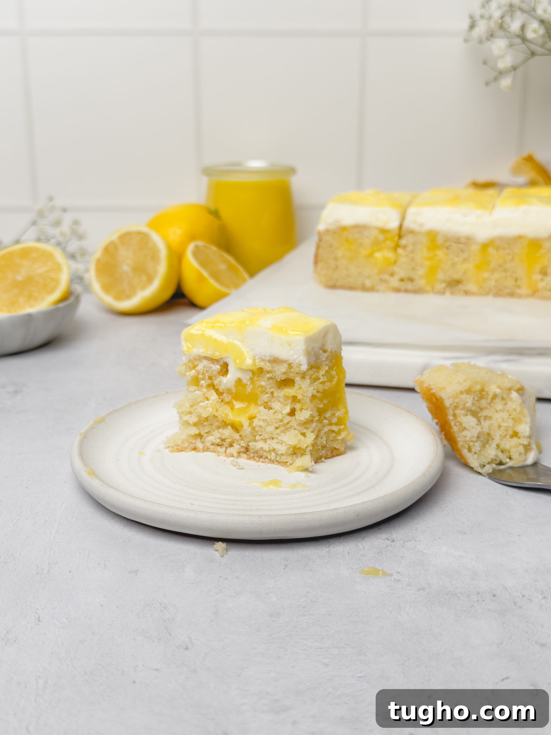 Lemon Curd Cake with Moist Layers and Citrus Cream 8 Lemon curd cake with creamy topping