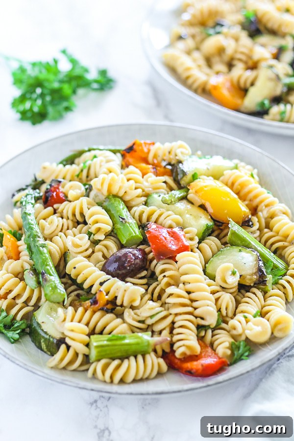Gluten Free Pasta Salad with Grilled Vegetables 4 close-up view of grilled vegetable pasta salad on round plate
