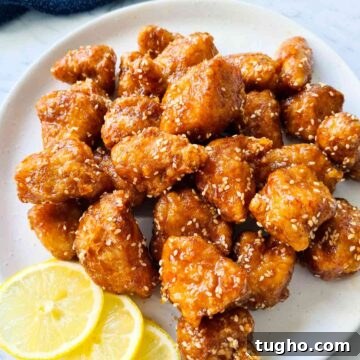 A plate of crispy glazed chicken bites