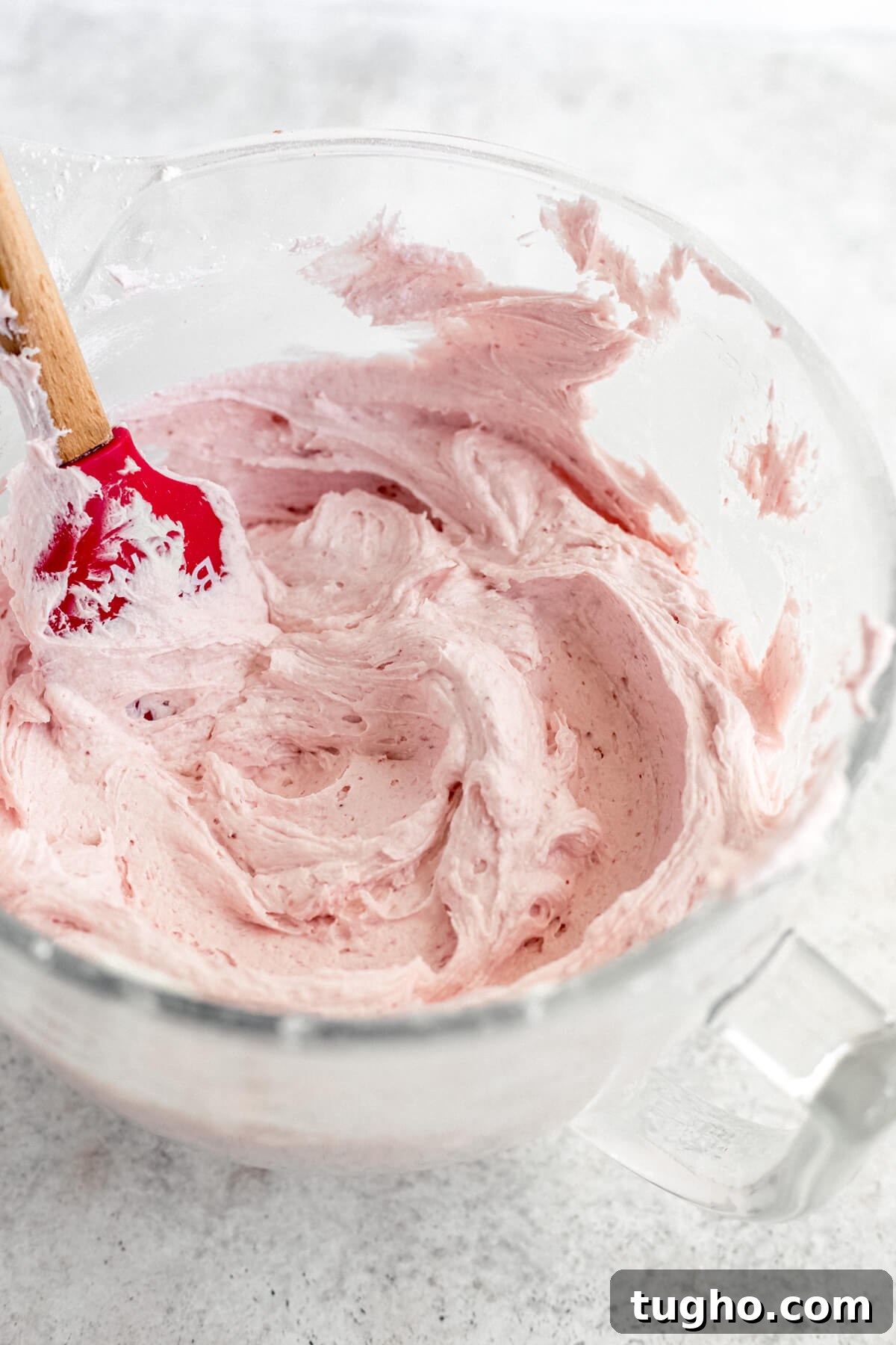 White Chocolate-Covered Strawberry Cake Recipe 7 white chocolate strawberry frosting in a glass stand mixer bowl