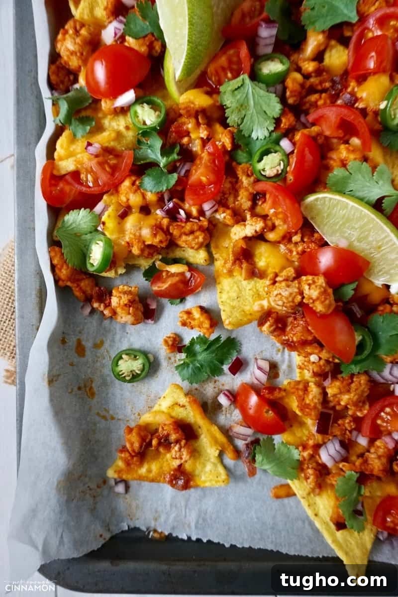 Lean Sheet Pan Turkey Nachos 4 overhead shot of easy sheet pan nachos made with ground turkey, cilantro, jalapenos and baked tortillas