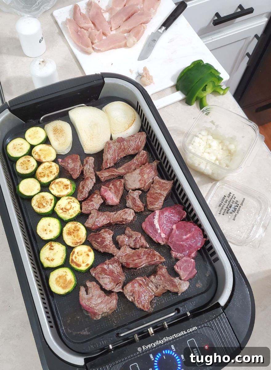 hibachi ingredients on a flat top grill