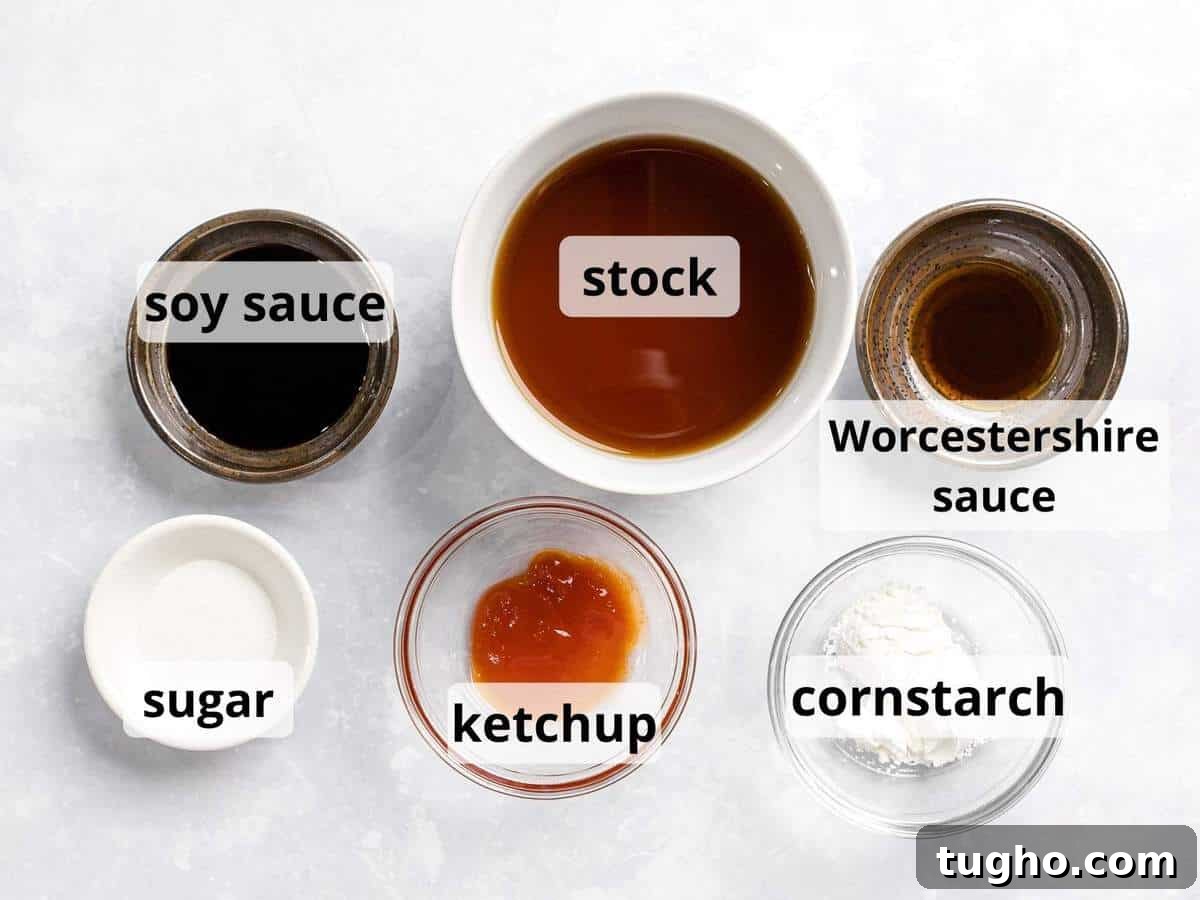 Loco Moco Recipe: Hawaiian Burger with Savory Brown Gravy 5 Ingredients for loco moco gravy in glass bowls including beef stock, cornstarch, soy sauce, and ketchup.