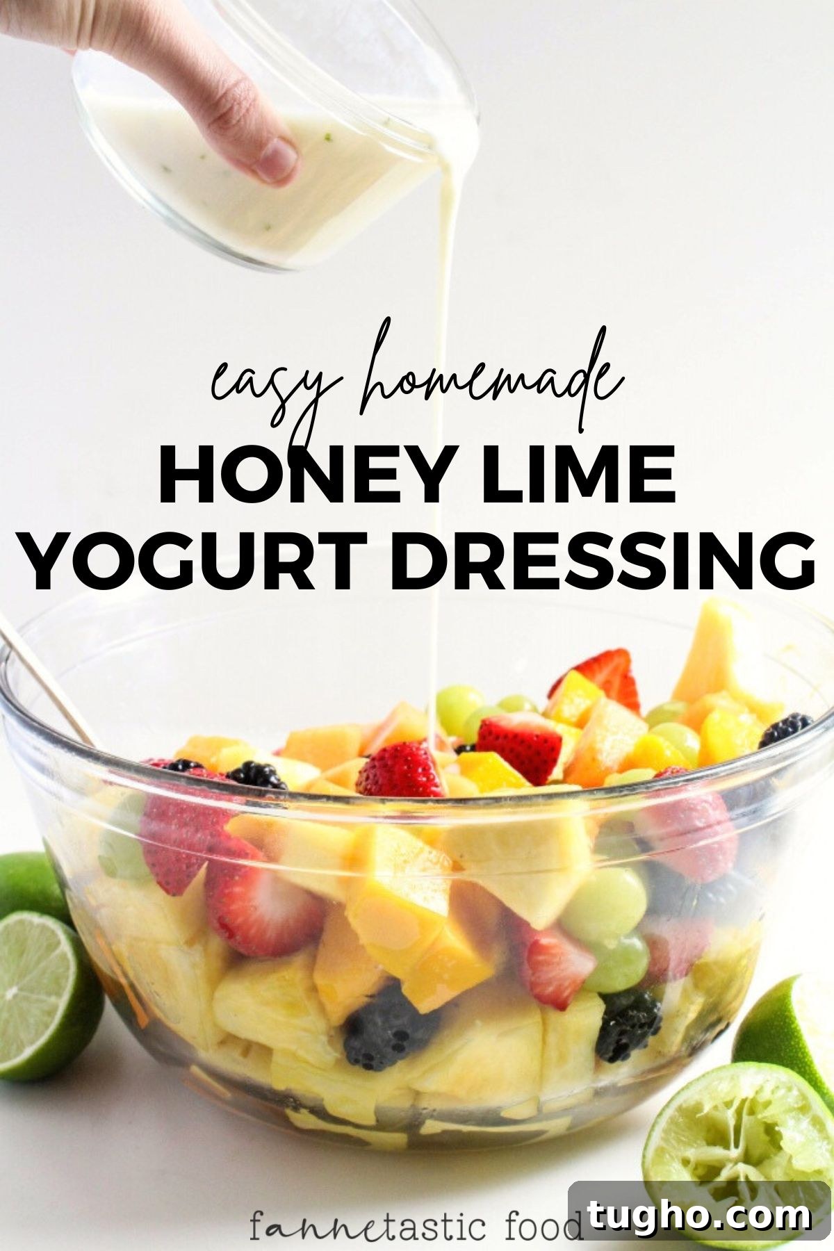 Creamy Honey Lime Greek Yogurt Dressing - 3 Ingredients 2 homemade lime Greek yogurt dressing with honey being poured over a glass bowl of fruit salad