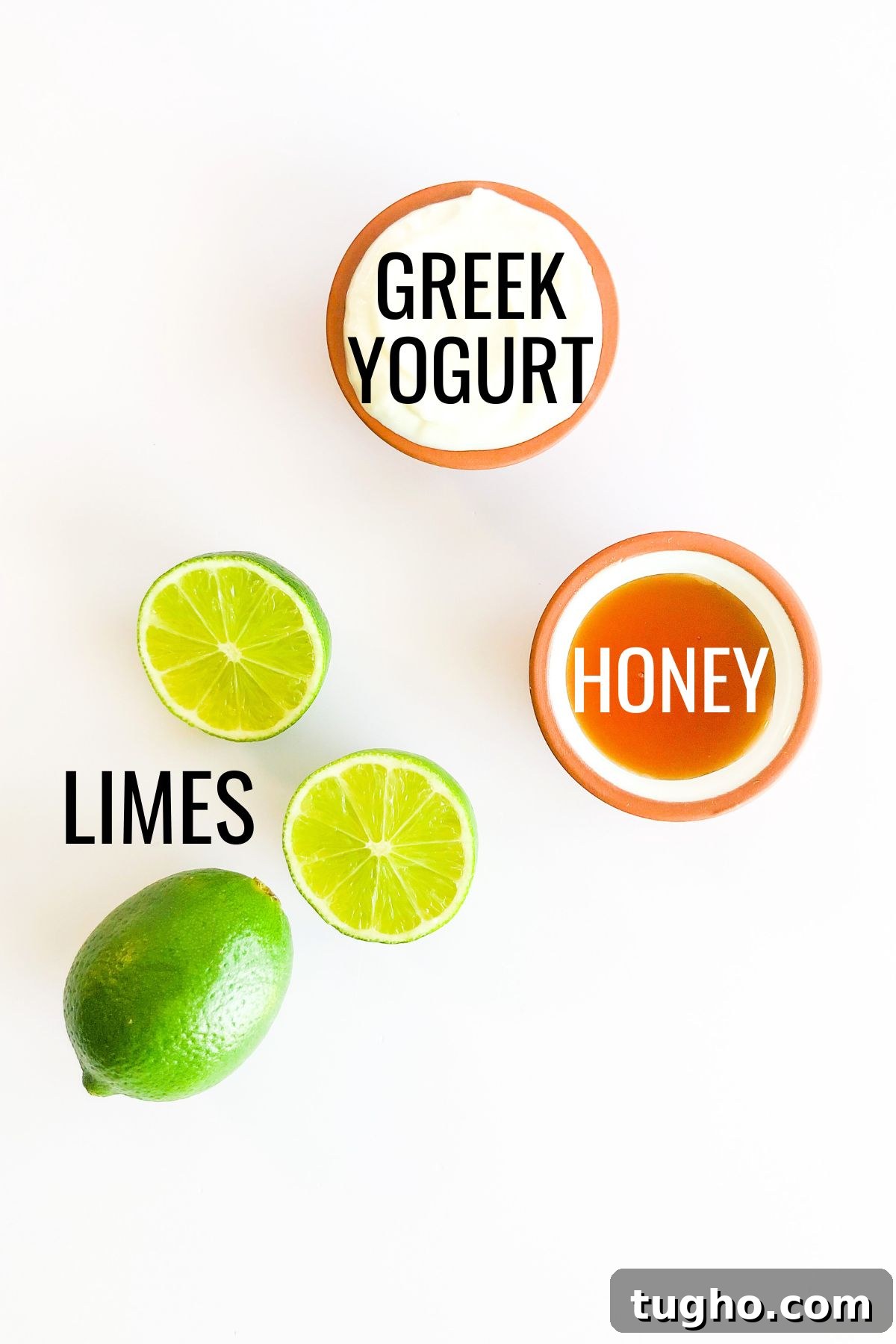 Creamy Honey Lime Greek Yogurt Dressing - 3 Ingredients 3 sliced limes, honey, Greek yogurt in small bowls