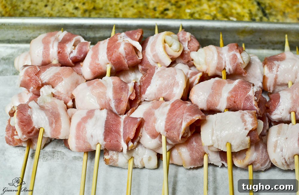 Crispy Pan-Fried Bacon-Wrapped Mochi Recipe 5 Tray of uncooked bacon wrapped mochi