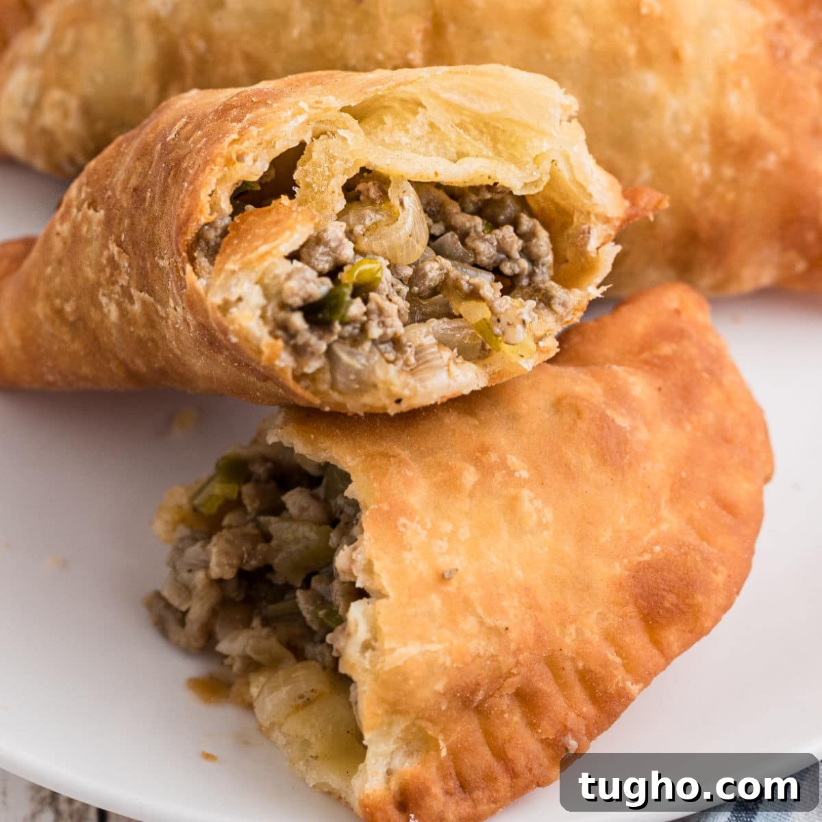 A natchitoches meat pie cut in half.