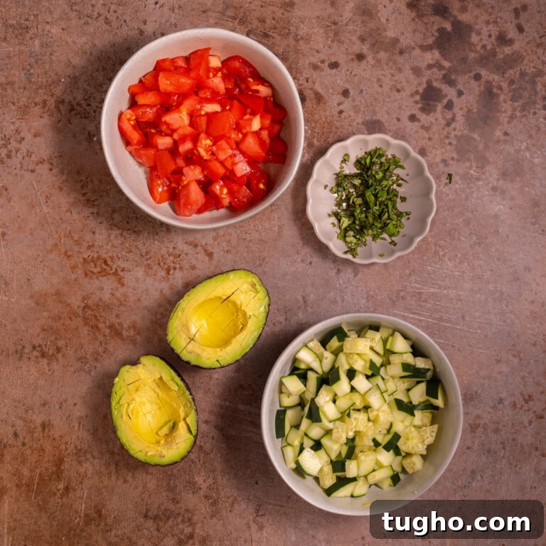 Vegan Lemon Pearl Couscous Salad 11 Diced tomato, cucumber, basil, and avocado flesh