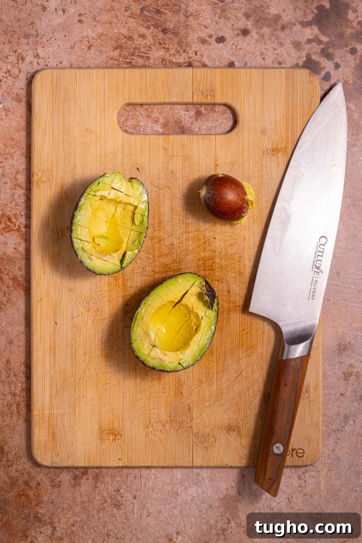 Vegan Lemon Pearl Couscous Salad 8 Avocado cut in half with pit removed